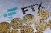 The FTX logo and a representation of cryptocurrencies are seen through broken glass in this illustration created on December 13, 2022. [REUTERS]