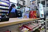 A cashier works at a convenience store in Seoul on Jan. 15. [YONHAP]