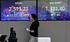 A screen in Hana Bank's trading room in central Seoul shows the Kospi closing at 2,513.21 points on Monday, up 0.49 percent, or 12.27 points, from the previous trading day. [YONHAP]