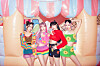 Blackpink dressed in hippie-style crochet clothing. [YG ENTERTAINMENT]