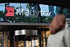 A passenger walks by Medytox's office in Gangnam, southern Seoul. [YONHAP]