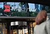 A passenger walks by Medytox's office in Gangnam, southern Seoul. [YONHAP]