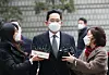 Lee Jae-yong is interviewed by reporters ahead of the verdict being read at the Seoul High Court in Seocho-dong, southern Seoul, on Jan. 18. [WOO SANG-JO]