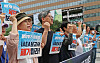 Protesters on Wednesday demand the International Atomic Energy Agency to scrap its report that approves Japan's plan to discharge Fukushima wastewater into the ocean in a rally held in Jongno District, central Seoul. [YONHAP]