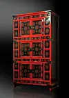 A three-storied snowflake-patterned cabinet, with intricately painted snowflakes. [PARK SANG-MOON]