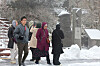Tourists walk through the snowfall which arrived at Mount Halla in Jeju Island on Monday morning after the heavy snow warning was lifted. Mount Halla experienced a low of minus 5.4 degrees Celsius (22.28 degrees Fahrenheit). [YONHAP]