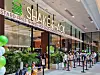Customers on Monday line up in front of Shake Shack's Westgate branch, the eighth store opened by the burger chain in Singapore. The branch was opened by SPC's Paris Croissant, which has the license to run the burger chain in Singapore, and is located in the first floor of the Westgate shopping mall in the country's Jurong Innovation District. [SPC GROUP]