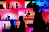 People pass an LG Electronics display during the CES tech show Tuesday, Jan. 6, in Las Vegas. [AP/YONHAP]