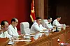 North Korean leader Kim Jong-un, center, speaks at a plenary meeting of the ruling Workers' Party Central Committee on Wednesday, during which he announced a new party congress to be held next January. [YONHAP]