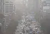 A view of the streets of Seoul in Jongno District is foggy as fine dust warnings were issued Tuesday. [YONHAP]