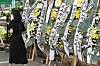 A person on Friday visits a memorial altar for a 23-year-old teacher who took her own life, located at Seoul Gangnam Seocho District Office of Education in southern Seoul. The teacher was found dead in a classroom at Seoul Seo 2 Elementary School in Seocho District, southern Seoul, on July 18. [NEWS1]