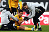 Wolverhampton Wanderers' midfielder Hwang Hee-chan receives medical attention during a Premier League match against Liverpool at the Molineux in Wolverhampton, England on Feb. 4.  [AFP/YONHAP]