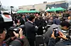 Democratic Party leader Lee Jae-myung greeted by Gwangju residents during his visit in April. [YONHAP]