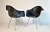 The upcycled Eams chairs using jeans and epoxy. [FABRIKR]