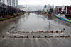 A park in Busan is submerged in rain on Friday morning. [YONHAP]