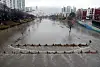 A park in Busan is submerged in rain on Friday morning. [YONHAP]