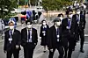 Members of the Korean band BTS arrive to security check-in at United Nations headquarters last month, during the 76th Session of the U.N. General Assembly in New York. They are wearing upcycled suits by Re;code. [AP.YONHAP]