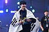 Hwang Sun-woo arrives for the podium ceremony of the men's 200-meter freestyle swimming event during the 2024 World Aquatics Championships at Aspire Dome in Doha on Tuesday. [AFP/YONHAP]