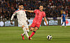 Korea's Cho Gue-sung, right, vies for the ball during the 2026 World Cup qualifier against Thailand at Rajamangala National Stadium in Thailand on March 26. [YONHAP]