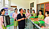 North Koreans appear without masks in a photograph of a publishing management bureau in North Hamgyong Province released by the North’s official Rodong Sinmum on Tuesday. [RODONG SINMUN]