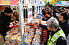 People look at products for sale at a Red Cross charity market at the Shade Tree Square at Busan City Hall on Thursday. [YONHAP]