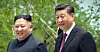 North Korean leader Kim Jong-un, left, and Chinese President Xi Jinping take a stroll at the Kumsusan State Guesthouse in Pyongyang as they hold their fifth summit in June 2019. [YONHAP]