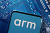 A smartphone with a displayed Arm Ltd logo is placed on a computer motherboard in this illustration taken March 6, 2023. [REUTERS]
