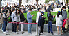 People line up to receive flight ticket coupons in front of the Coffee Bean Gwanghwamun Branch in Jongno District, central Seoul, on Thursday, where Air Seoul International is holding its International Flight Re-Opening Festival. To celebrate the full resumption of international flights, Air Seoul is holding an event to sell round-trip tickets to Guam, Saipan, Da Nang and Boracay at a discount of up to 97 percent for 1,000 customers. [YONHAP]