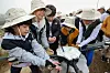 Members of the KT DMZ Ecological Conservation Group use drones to feed migratory birds on Thursday. [KT]