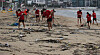 Officials of Suyeong District Office in Busan clean up Gwangalli Beach on Thursday morning after Typhoon Bavi passed. [SONG BONG-GEUN]