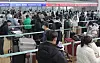 Travelers off to Shanghai stand in line to check in for their flights at Incheon International Airport on Wednesday. [YONHAP]