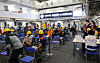 Residents from remote islands wait to receive Janssen's Covid-19 vaccines at a mass vaccination center installed on Korea's first military training vessel, Hansando, off Jin Island, South Jeolla, on Monday. The 4,500-ton Hansando is equipped with the largest medical center and the highest number of sickbeds among the country's warships. [YONHAP]