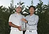 Kim Si-woo poses with his father and The Championship trophy during the final round of The Players Championship at TPC Sawgrass in Ponte Vedra Beach in Florida on May 14, 2017. [GETTY IMAGES]