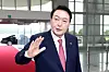 President Yoon Suk-yeol addresses the controversy over the police’s premature announcement of a reshuffling of high-ranking police officials, speaking to reporters at the presidential office in Yongsan, central Seoul, Thursday. [YONHAP]