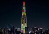 Graphics commemorating Pepero Day, an annual holiday on which Korean residents gift the snack to their loved ones, will appear on Lotte World Tower in Jamsil, southern Seoul, from 6 p.m. to 10 p.m. on Tuesday. [LOTTE WELLFOOD]