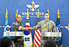 Joint Chiefs of Staff spokesman Col. Lee Sung-jun, left, and United States Forces Korea spokesman Col. Ryan Donald shake hands at a joint press briefing on the Ulchi Freedom Shield exercise at the Defense Ministry in Seoul on Monday. [JOINT CHIEFS OF STAFF]