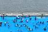On June 29, as temperatures in Seoul soared to 30 degrees Celsius (86 degrees Fahrenheit) under sweltering midday heat, people are enjoying the water at the Nanji Hangang Park swimming area in Mapo District, western Seoul. [YONHAP]