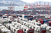 Containers being loaded at a port in Busan on Wednesday [YONHAP]