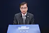 Suh Hoon, South Korea’s director of the National Security Office in the Blue House, relays North Korea’s message about its recent killing of a South Korean official at a press briefing Friday. [YONHAP]