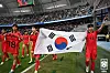 The Korean U-20 national team celebrates with the Korean flag after beating Nigeria 1-0 in the U-20 World Cup quarterfinals at Estadio Unico Madre de Ciudades in Santiago del Estero, Argentina on Sunday. [NEWS1]