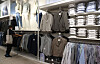 A shopper browses through clothes at a clothing shop in Seoul on April 13. [YONHAP]