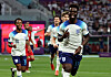 England's Bukayo Saka celebrates scoring his team's second goal against Iran on Monday.  [REUTERS/YONHAP]