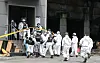 Joint investigators from the police, fire station and the National Forensic Service on Tuesday walk into the Coupang’s Deokpyeong logistics center in Icheon, Gyeonggi, which was burnt down recently, to determine the cause of the fire. [NEWS1]