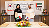 Samyang Foods CEO Kim Jung-soo, left, and Sarya General Trading CEO Abdulla Mohamed Helal Al Kaabi pose at a partnership agreement signing in the UAE on Tuesday. [SAMYANG FOODS]