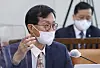 Bank of Korea Governor nominee Rhee Chang-yong speaks at a confirmation hearing at the National Assembly in Yeouido, western Seoul, on Tuesday. [YONHAP]