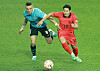 Lee Kang-in, right, in action during a friendly with Uruguay at Seoul World Cup Stadium in Mapo District, western Seoul on Tuesday. [YONHAP]