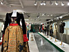 A view of the “L’Italia è di Moda' exhibition, now on view at High Street Italia in southern Seoul. The dress at front is a 2002 Etro long-tailed dress with its classic brown paisley prints paired with a black silk and satin bolero jacket. [SHIN MIN-HEE]