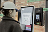 A visitor demonstrates how to pay using Naver Financial's FaceSign service at Kyung Hee University's cafeteria in Dongdaemun District, central Seoul [NAVER]