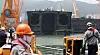 Workers oversee Daewoo Shipbuilding & Marine Engineering's shipyard in Geoje, South Gyeongsang, on Monday. [YONHAP]