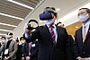Prime Minister Chung Sye-kyun wears a virtual reality (VR) headset to experience a VR smart factory during his visit to Open Lab in LG’s Science Park in Gangseo District, western Seoul, on Wednesday. [NEWS1]